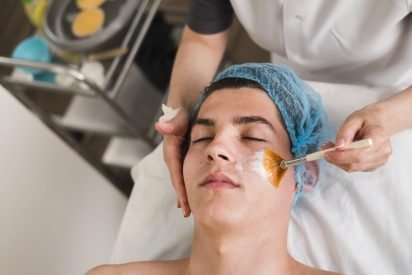 boy-receiving-facial-treatment-beauty-salon